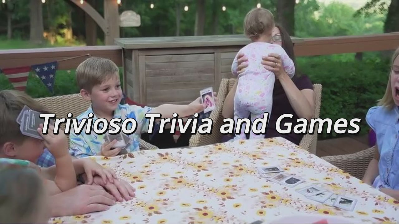 Load video: family playing trivioso card games at a dinner table